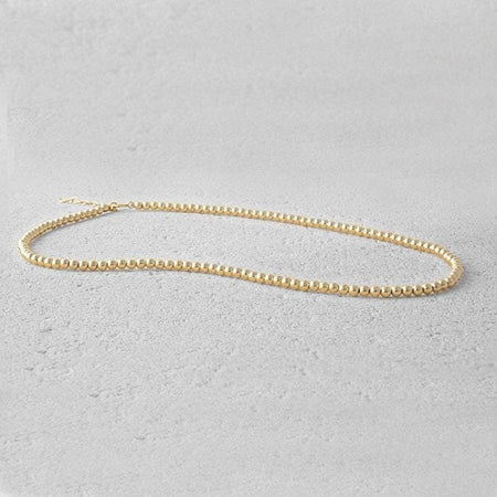 Dainty Gold Filled Beaded Necklace with Horse Shoe Charm and Cubic Zirconia for Women by Isabella Celini