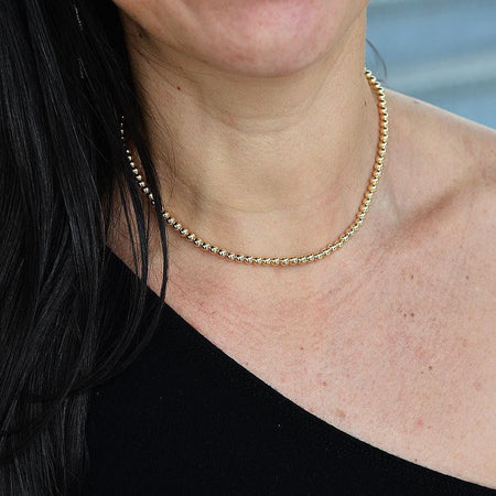 Dainty Gold Filled Beaded Necklace with Horse Shoe Charm and Cubic Zirconia for Women by Isabella Celini
