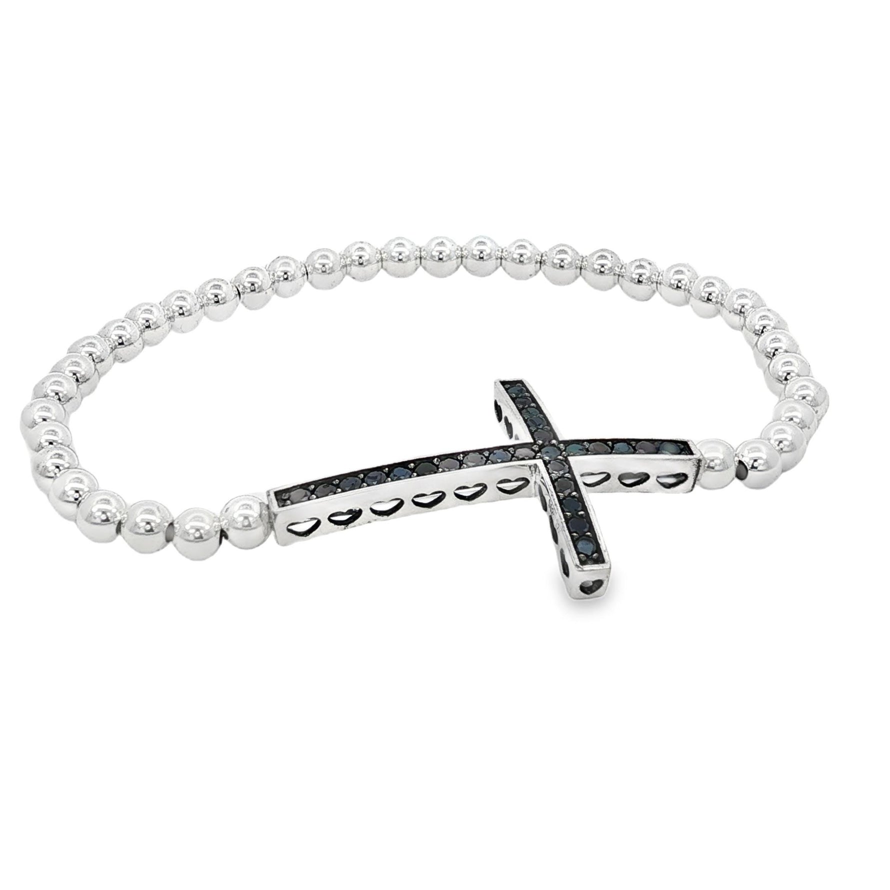 A silver-toned bracelet with a cross-shaped charm featuring black gemstones.